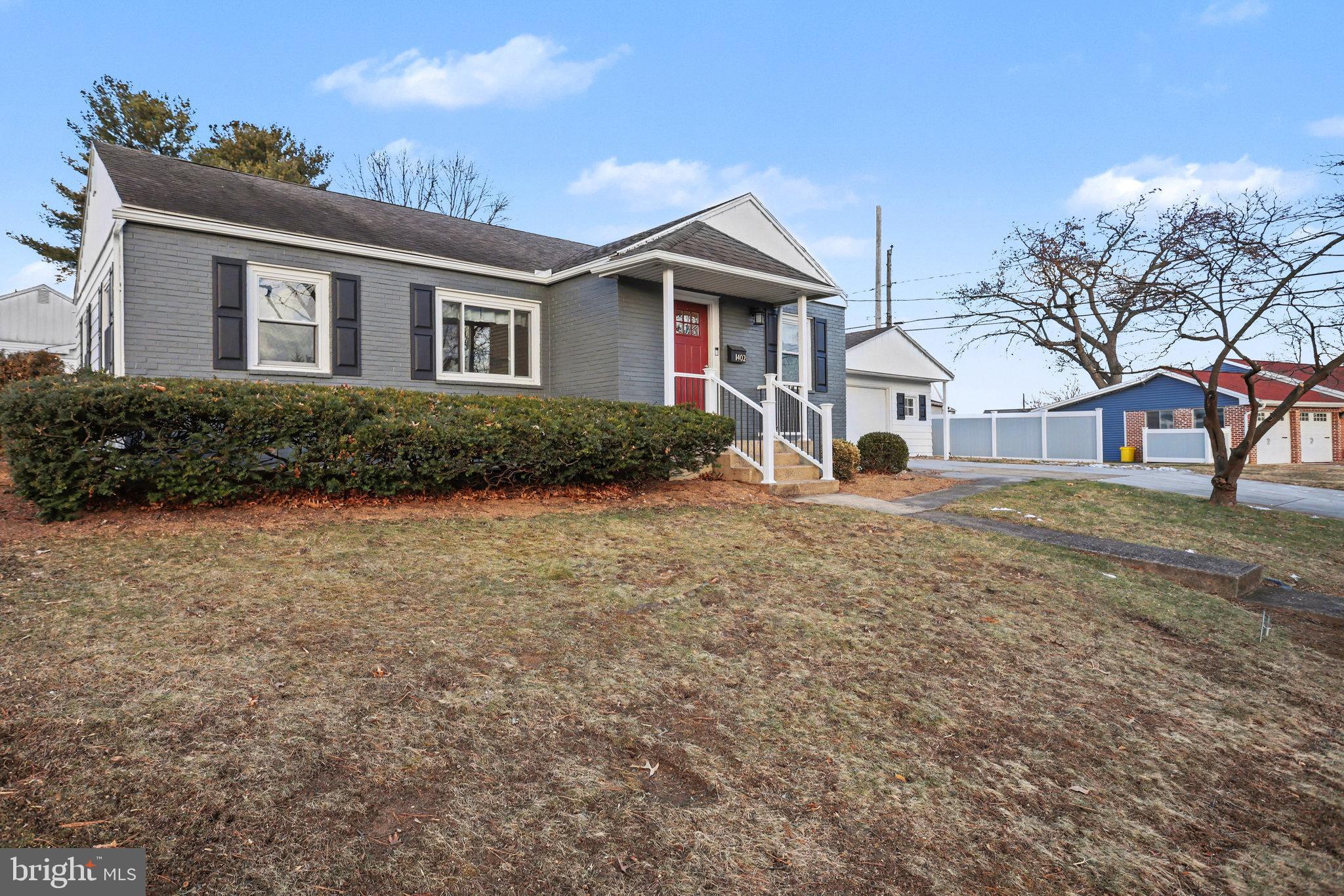 1402 Warwick Road Camp Hill, PA 17011 - Photo 2 of 36 a front view of a house with garden