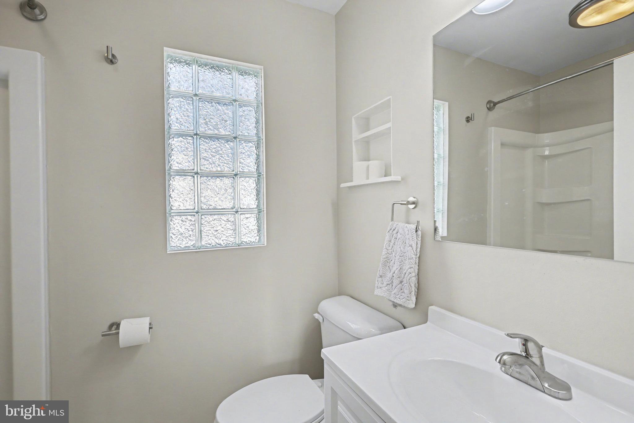 1402 Warwick Road Camp Hill, PA 17011 - Photo 22 of 36 a bathroom with a sink toilet and shower
