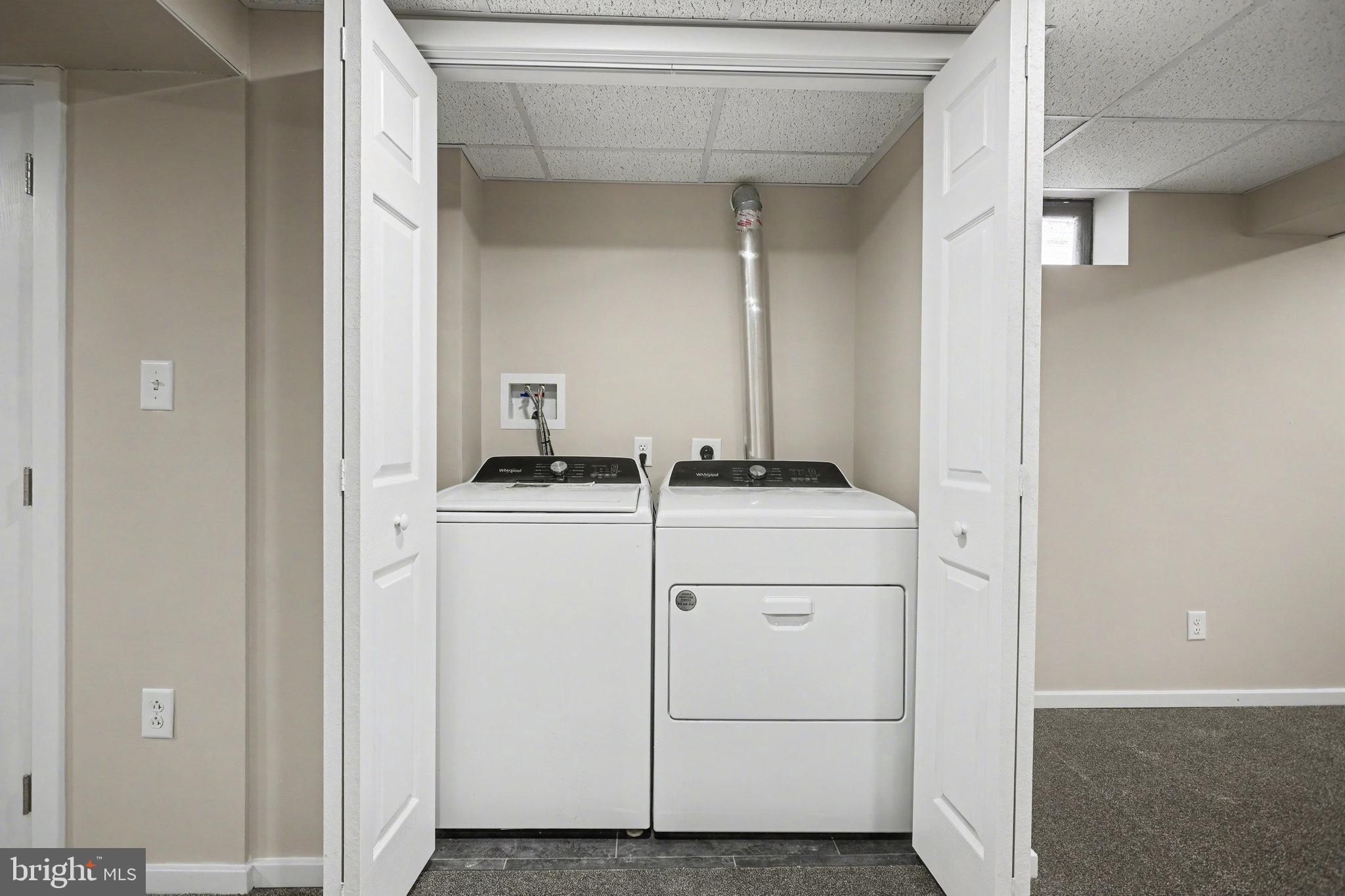 1402 Warwick Road Camp Hill, PA 17011 - Photo 28 of 36 a room with dryer and washer