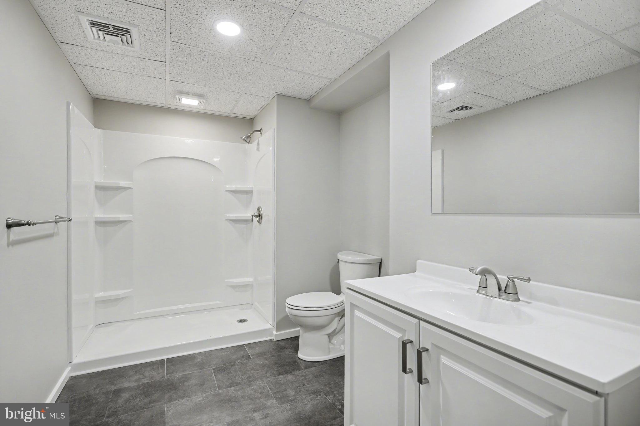 1402 Warwick Road Camp Hill, PA 17011 - Photo 30 of 36 a bathroom with a sink a toilet and shower