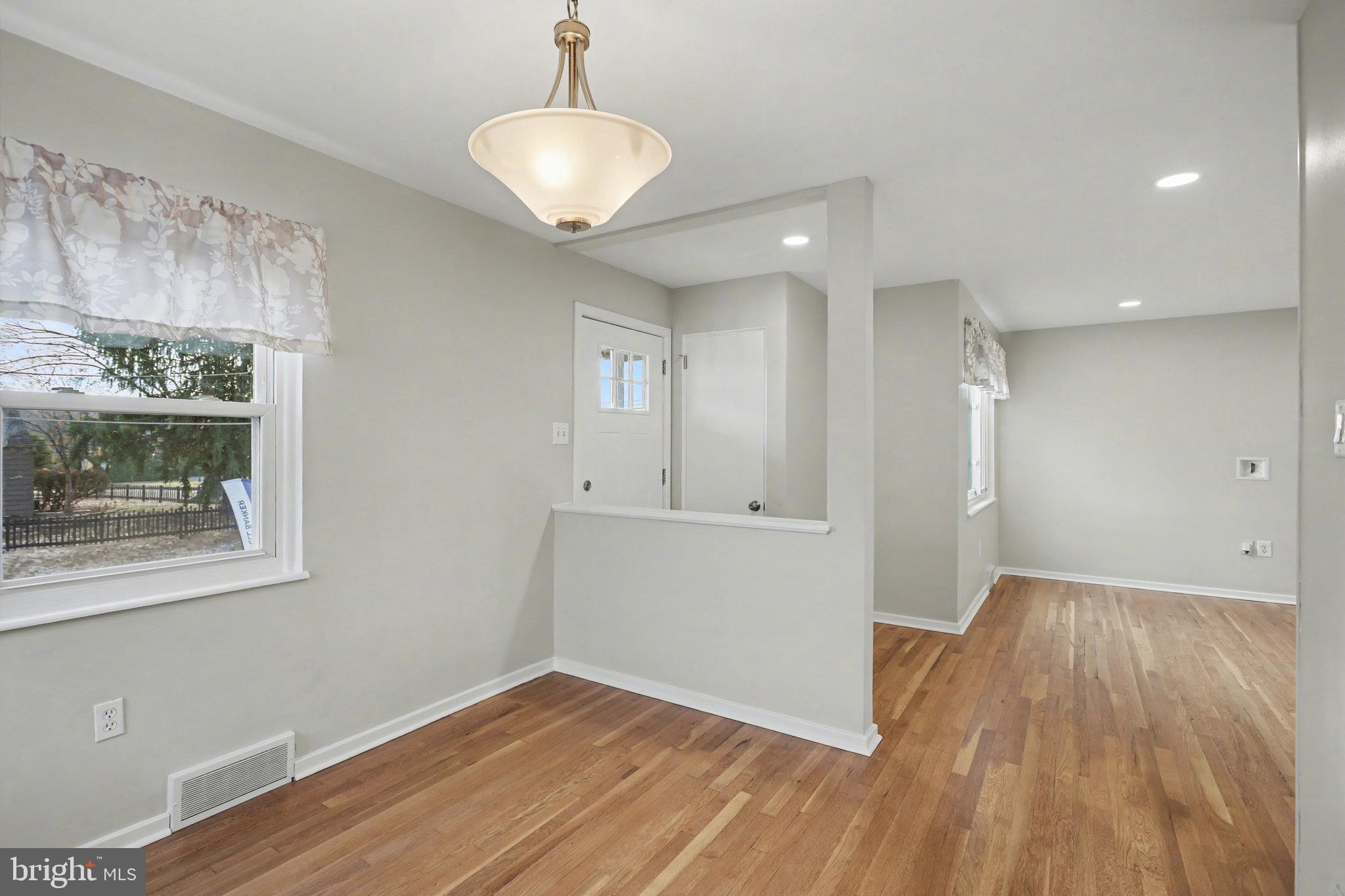 1402 Warwick Road Camp Hill, PA 17011 - Photo 9 of 36 a view of a room with wooden floor and a window