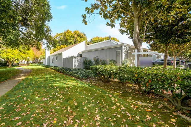 a house view with a garden space