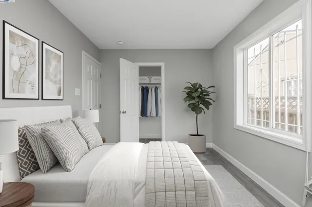 a bedroom with a bed and window