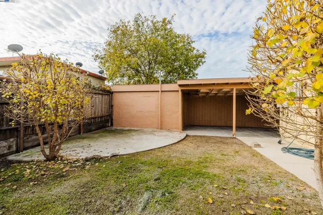a house with trees in front of it