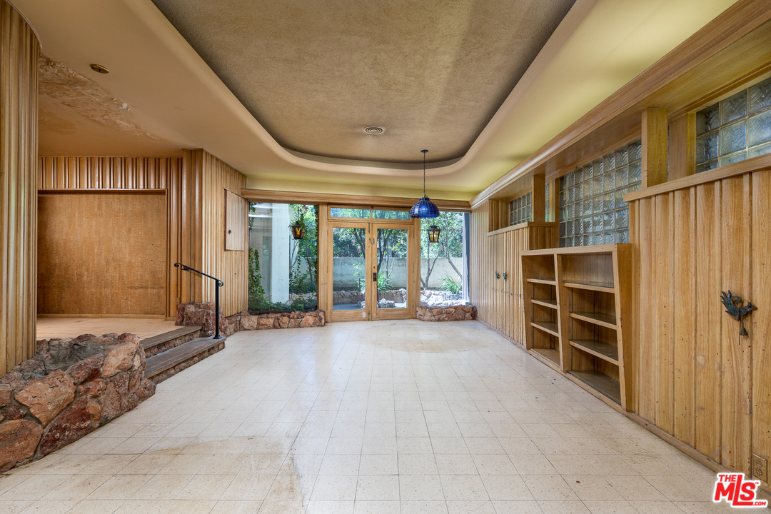 520 North Camden Drive Beverly Hills, CA 90210 - Photo 4 of 6 a view of an empty room with a window