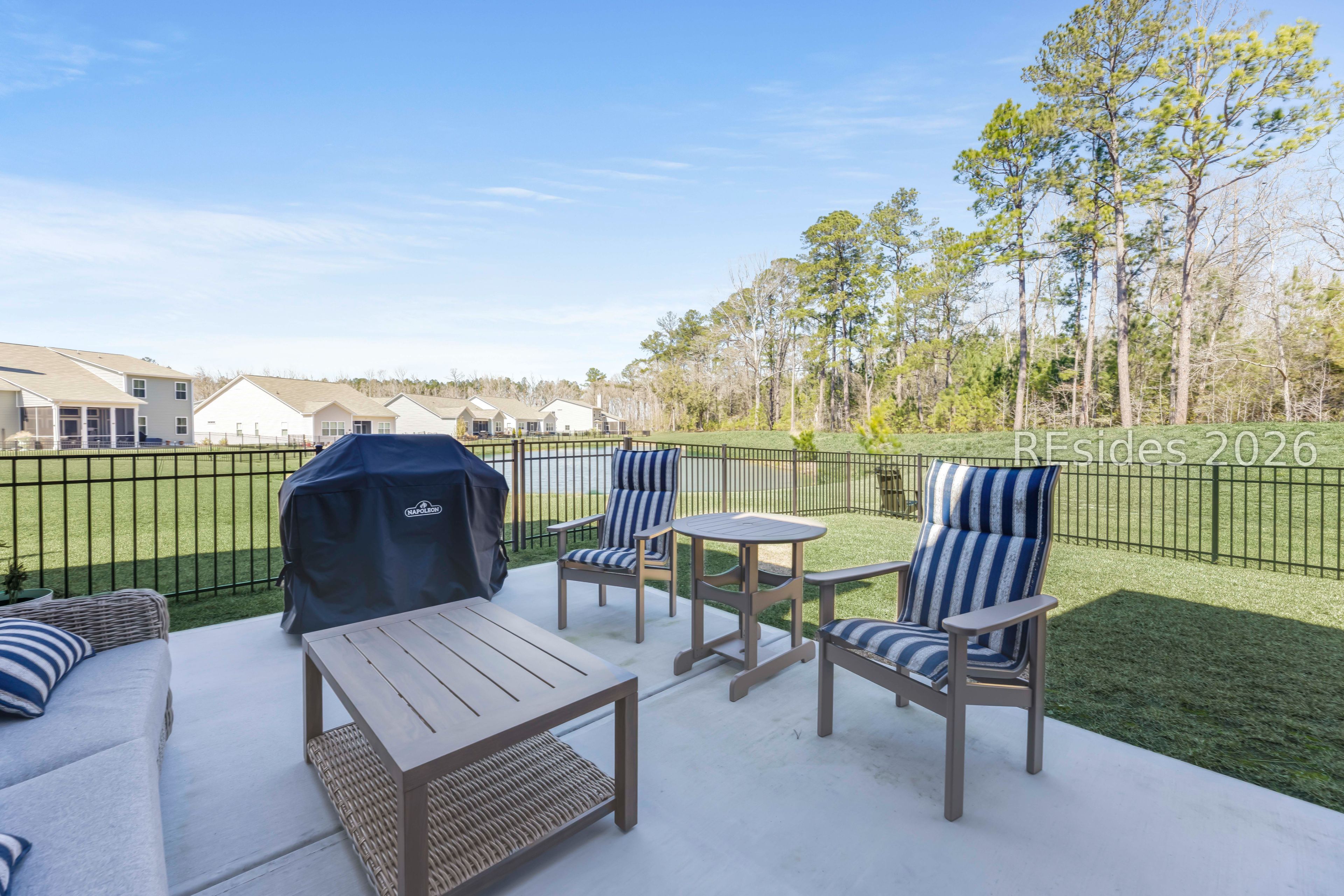 263 Monument Street Ridgeland, SC 29936 - Photo 3 of 61 Lagoon and wooded view; private backyard!