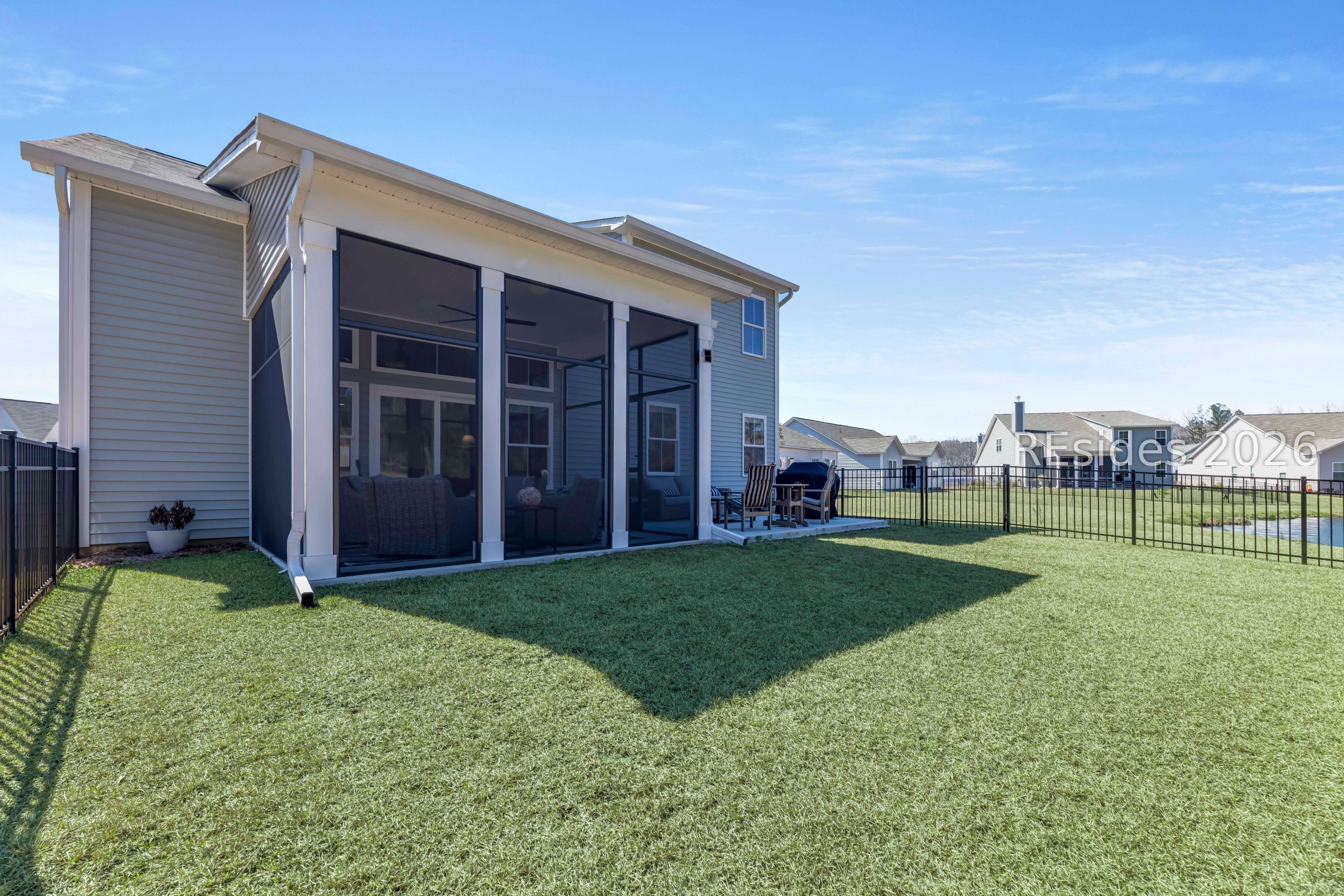 263 Monument Street Ridgeland, SC 29936 - Photo 41 of 61 Regal screened porch. Grass color enhanced.
