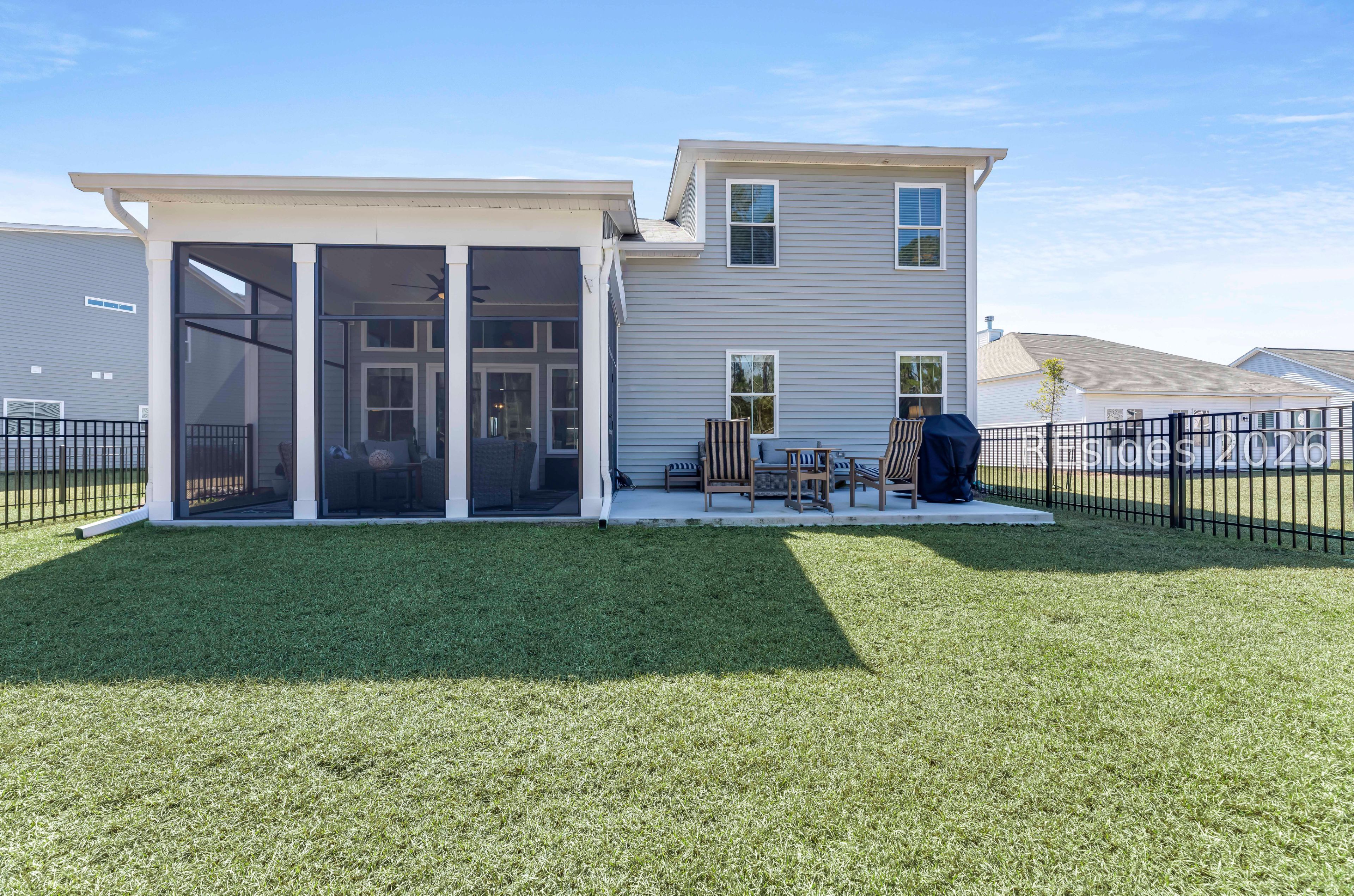 263 Monument Street Ridgeland, SC 29936 - Photo 42 of 61 Additional patio; grass color enhanced