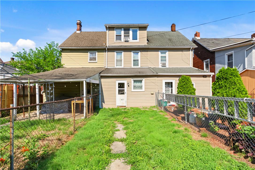 431 Pierce Street Bethlehem, PA 18015 - Photo 19 of 27 A well-maintained fenced yard offers a private outdoor space for leisure.