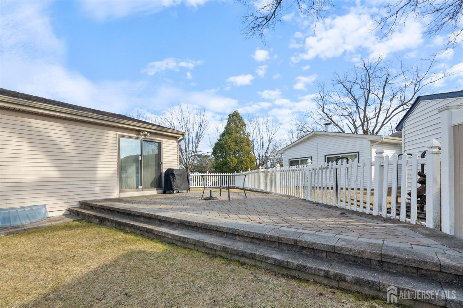 31 Villanova Road Old Bridge, NJ 08859 - Photo 29 of 29 a view of house with a big yard and large tree
