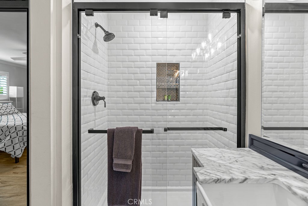 1321 Beryl Street, Unit 101 Redondo Beach, CA 90277 - Photo 7 of 40 a bathroom with a sink and a mirror