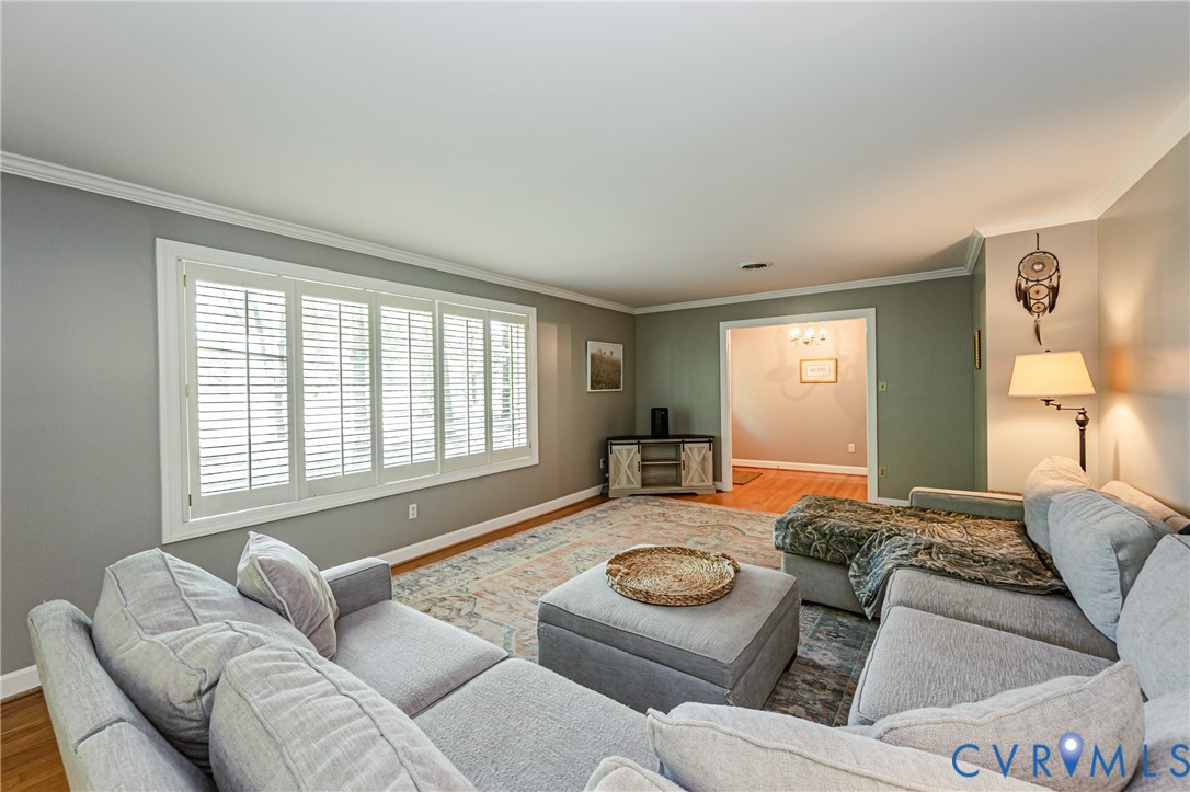 15611 Robert Terrell Road Montpelier, VA 23192 - Photo 6 of 28 Living area featuring white plantation shutters, c
