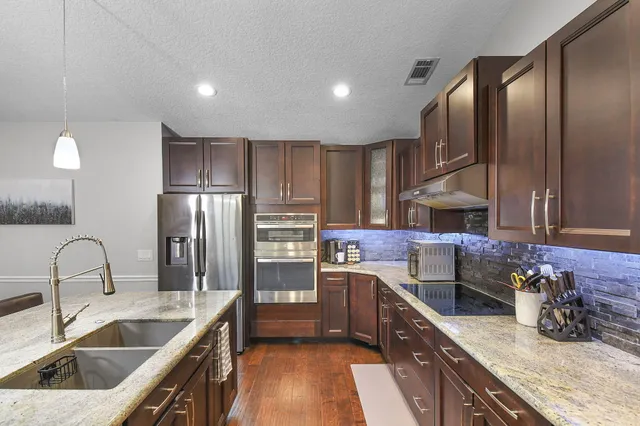 a house with garden in front of it