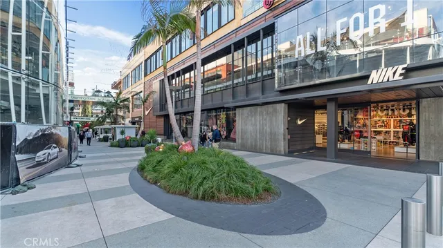 a view of a building with sitting area