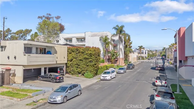 a view of a street with cars