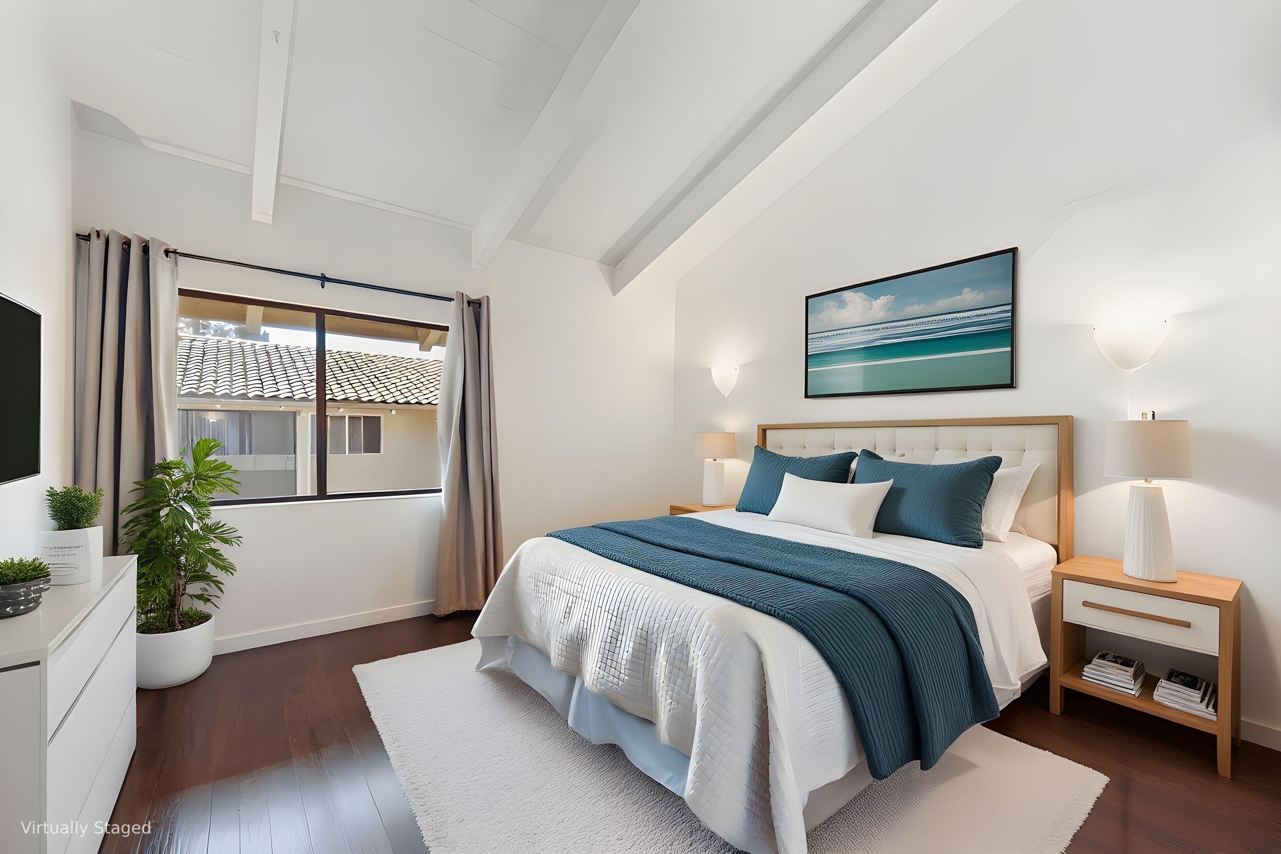 31 Dearborn Place, Unit 36 Goleta, CA 93117 - Photo 3 of 8 a bedroom with a bed and a large window