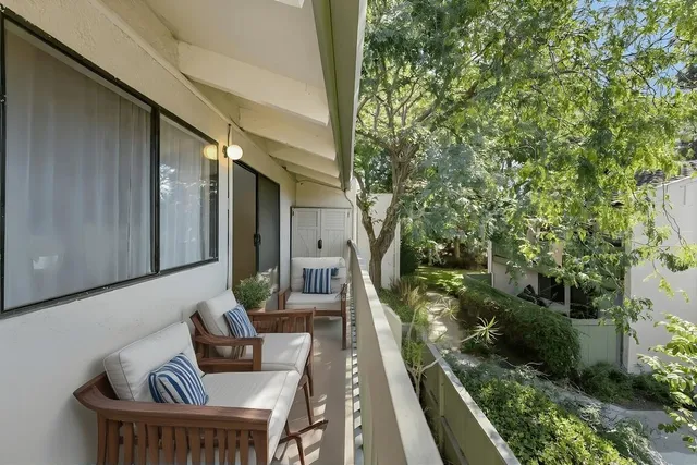 a backyard of a house with lots of green space