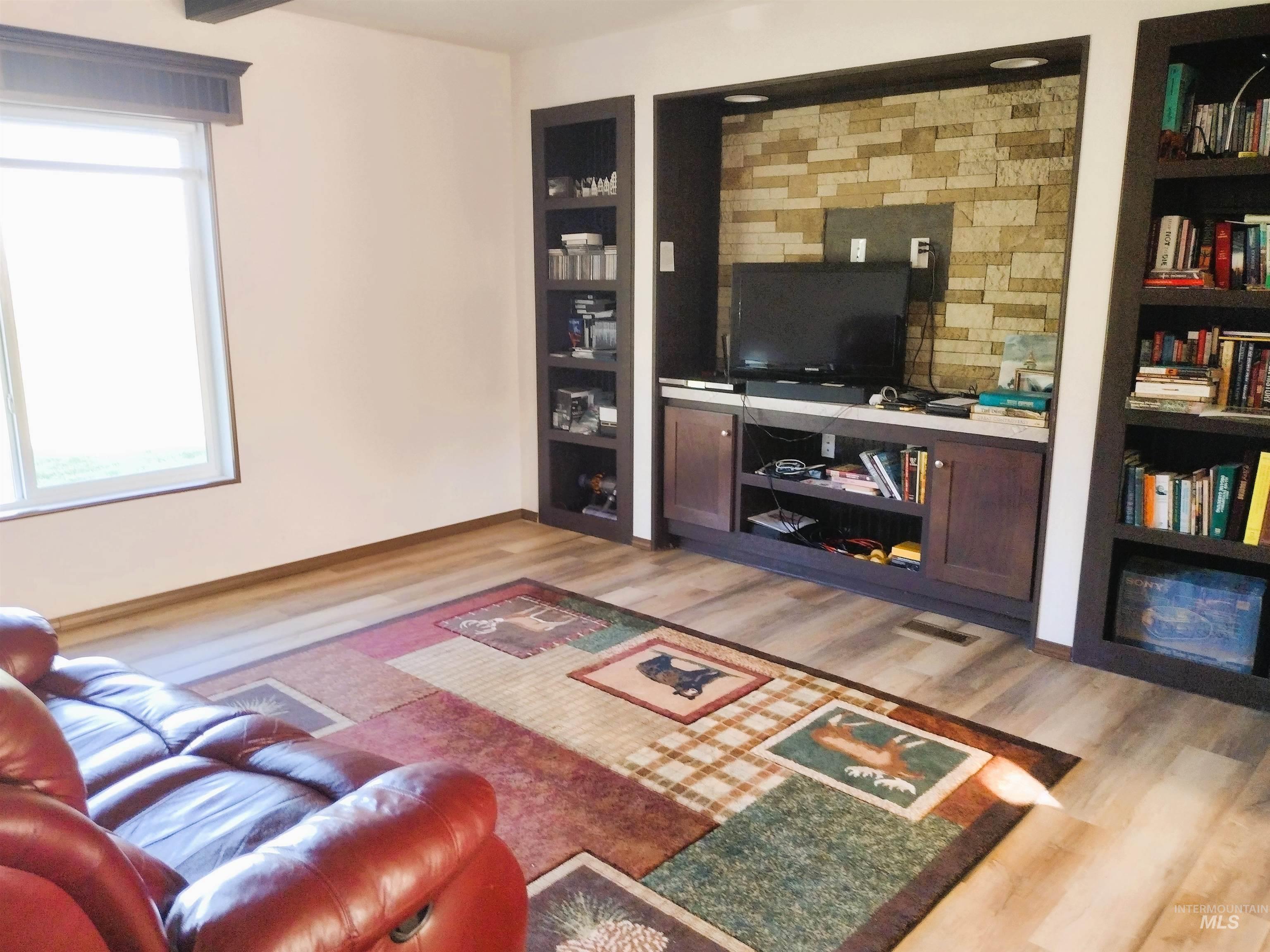 142 Shenandoah Third Street Kamiah, ID 83536 - Photo 22 of 50 Living area featuring light wood finished floors and built in features