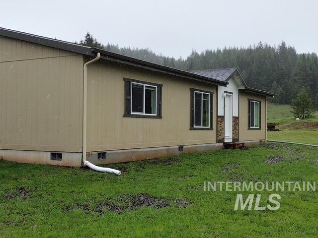 142 Shenandoah Third Street Kamiah, ID 83536 - Photo 3 of 50 Modular-style residence featuring tan siding and a dark brown roof