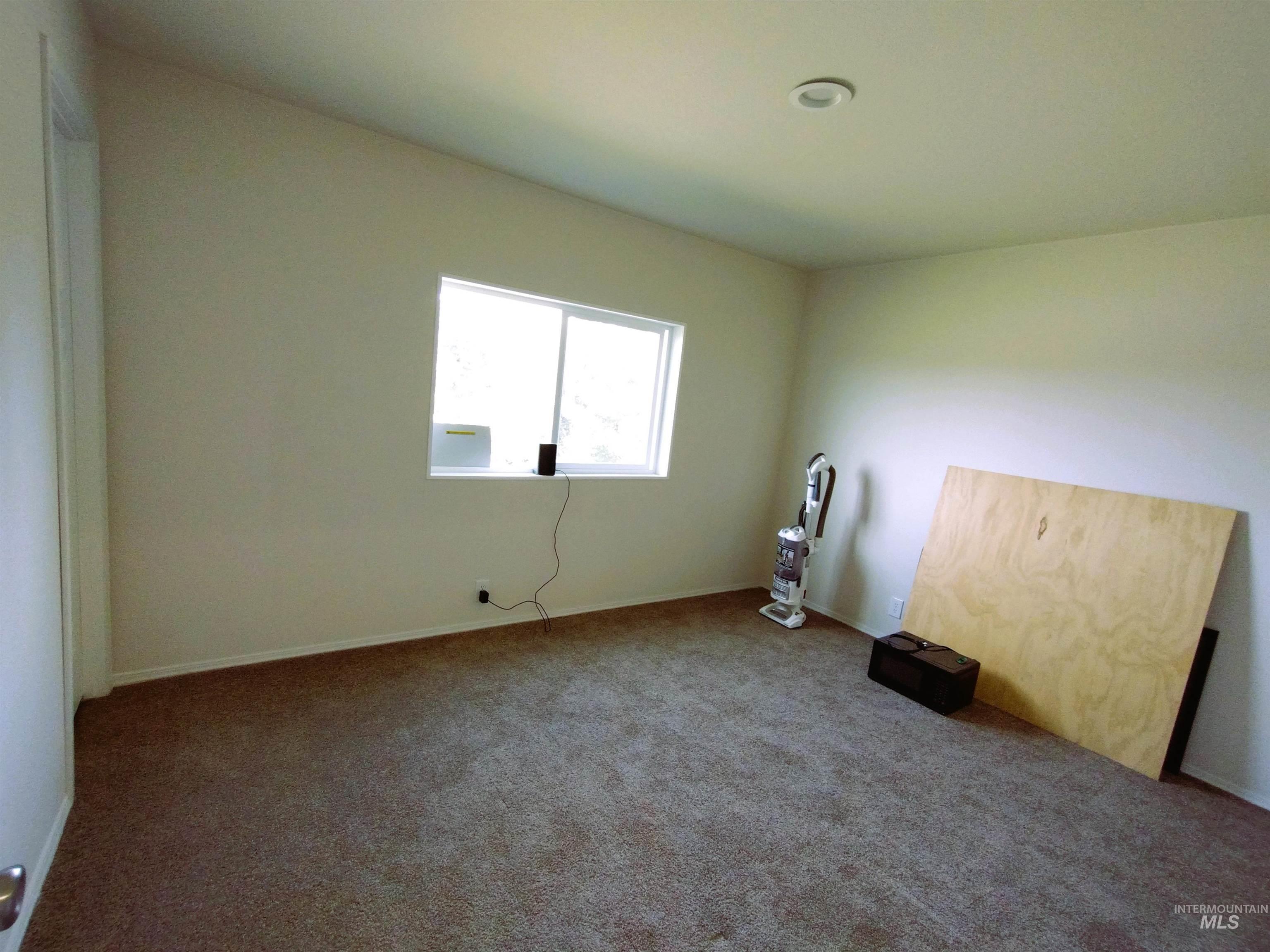 142 Shenandoah Third Street Kamiah, ID 83536 - Photo 41 of 50 Unfurnished bedroom featuring carpet and baseboards