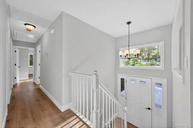 a view of a hallway with a window