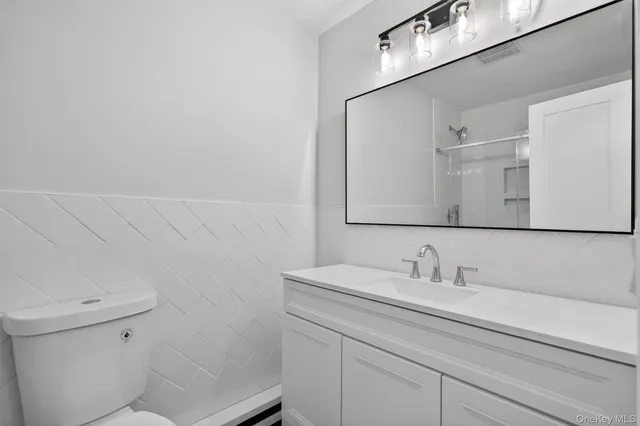 a bathroom with a sink and a toilet