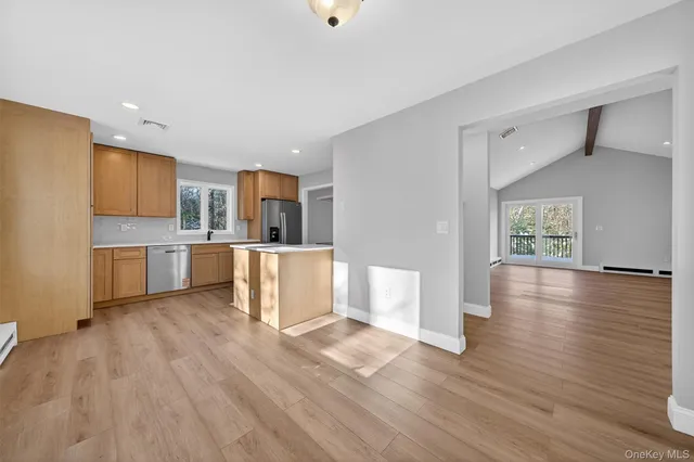 a view of kitchen with wooden floor