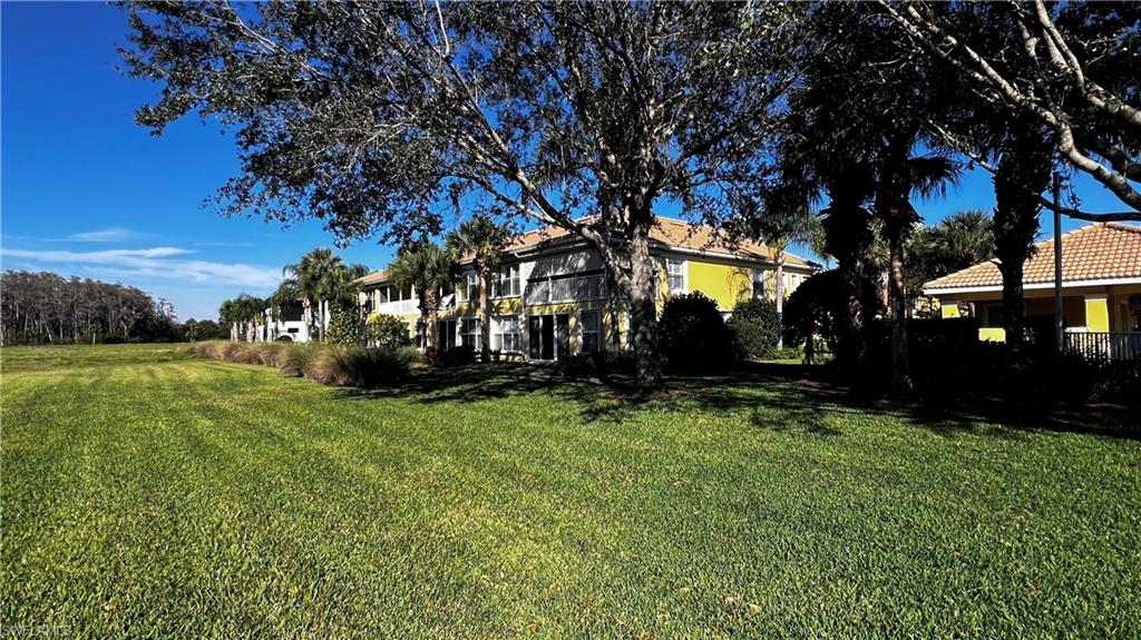 5705 Mayflower Way, Unit 1402 Ave Maria, FL 34142 - Photo 34 of 35 a view of a park