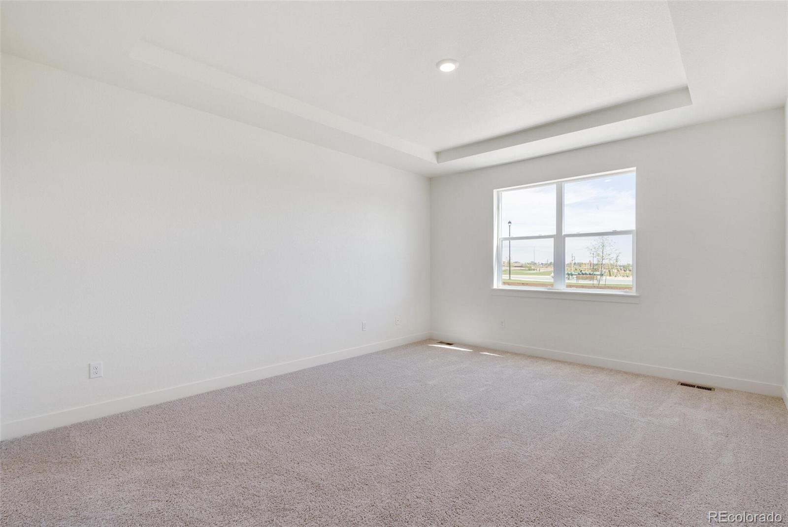 1105 Clara View Drive Berthoud, CO 80513 - Photo 19 of 35 an empty room with windows