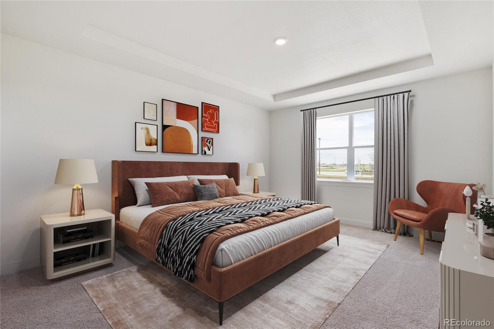 1105 Clara View Drive Berthoud, CO 80513 - Photo 3 of 35 a spacious bedroom with a bed and a chair in it