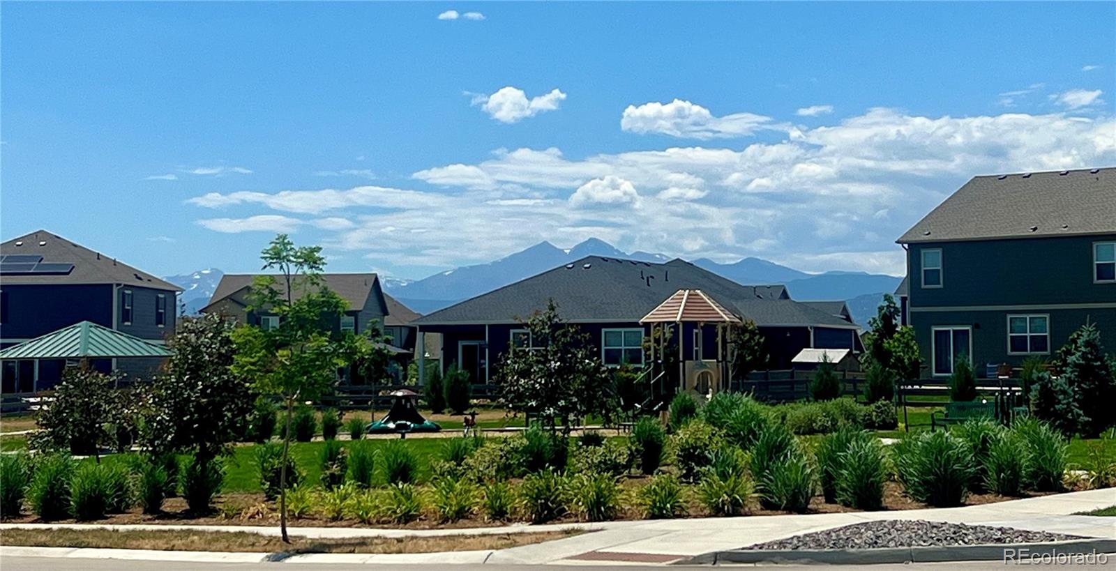 1105 Clara View Drive Berthoud, CO 80513 - Photo 31 of 35 a front view of a house with yard and green space