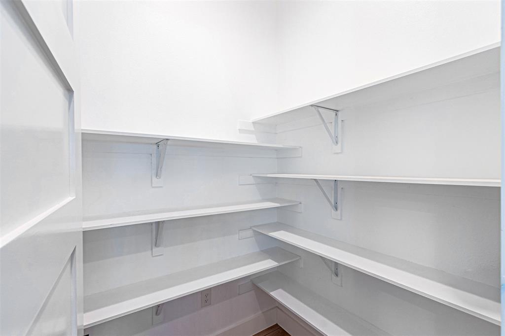 4309 Sylvester Street Dallas, TX 75219 - Photo 11 of 39 a view of an empty walk in closet