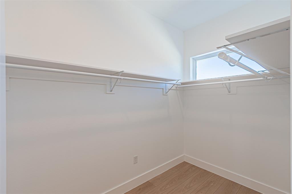 4309 Sylvester Street Dallas, TX 75219 - Photo 21 of 39 a view of an empty walk in closet