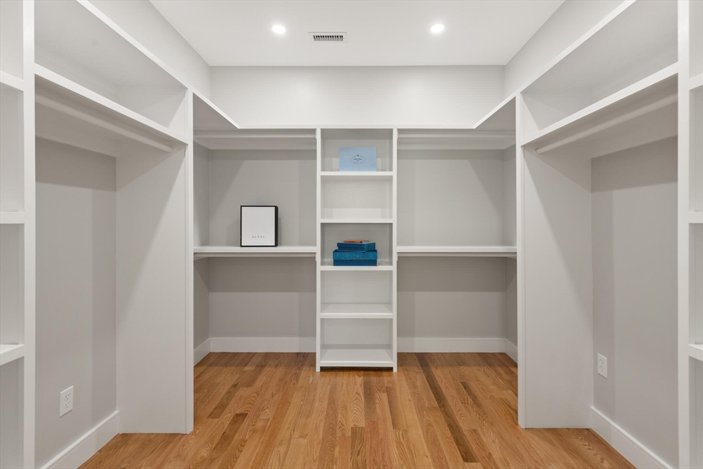 33 Barbara Road Newton, MA 02465 - Photo 23 of 42 a view of an empty walk in closet