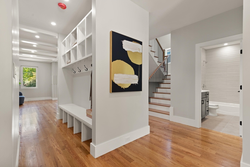33 Barbara Road Newton, MA 02465 - Photo 8 of 42 a living room with wooden floor and furniture