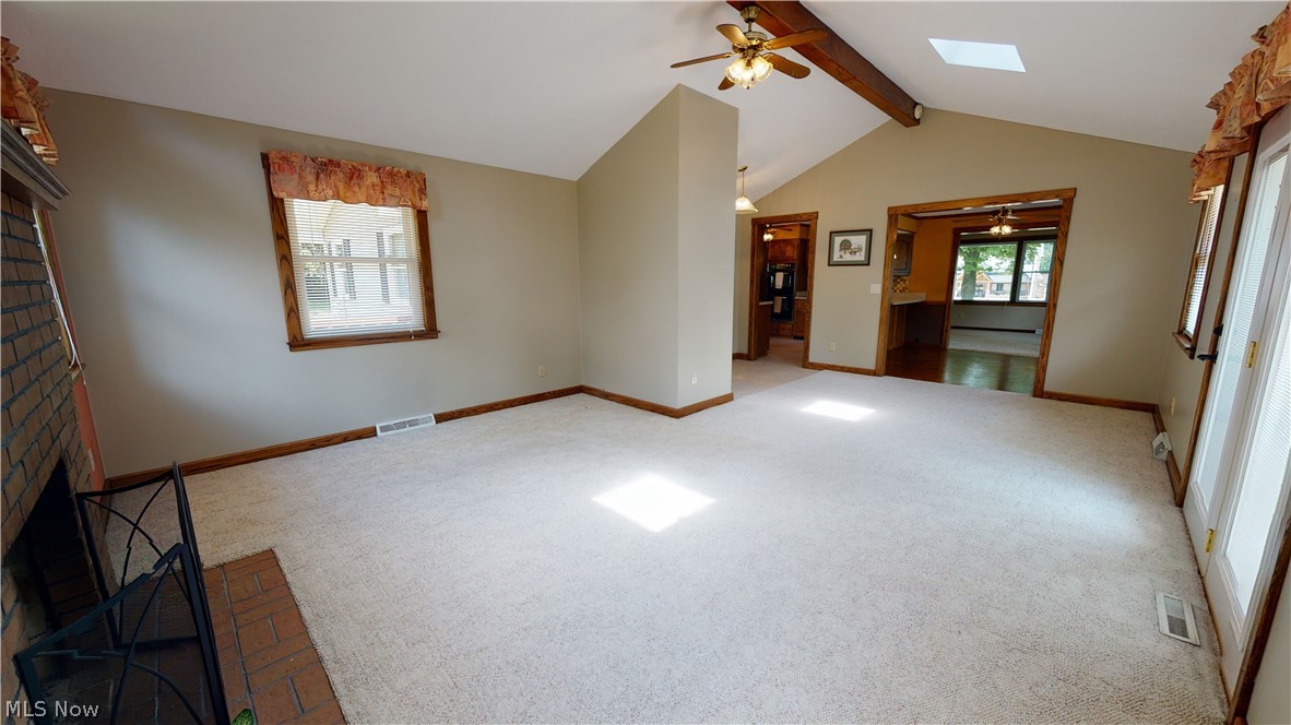 18142 Madison Road Middlefield, OH 44062 - Photo 5 of 35 A view of the family room showing how it opens up to the dining room and kitchen. This addition was added in 1993, along with a full basement area.