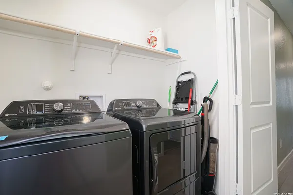 a utility room with dryer and washer