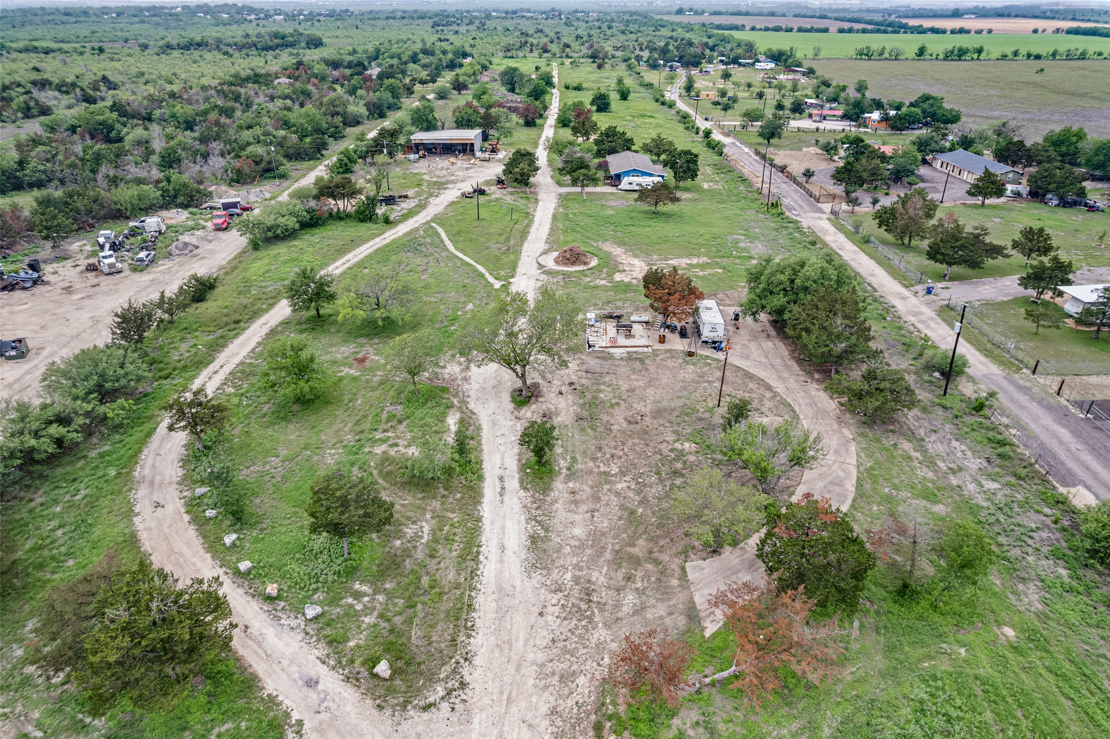 11622 Doyle Overton Road Austin, TX 78719 - Photo 11 of 20 an aerial view of residential houses with outdoor space and trees