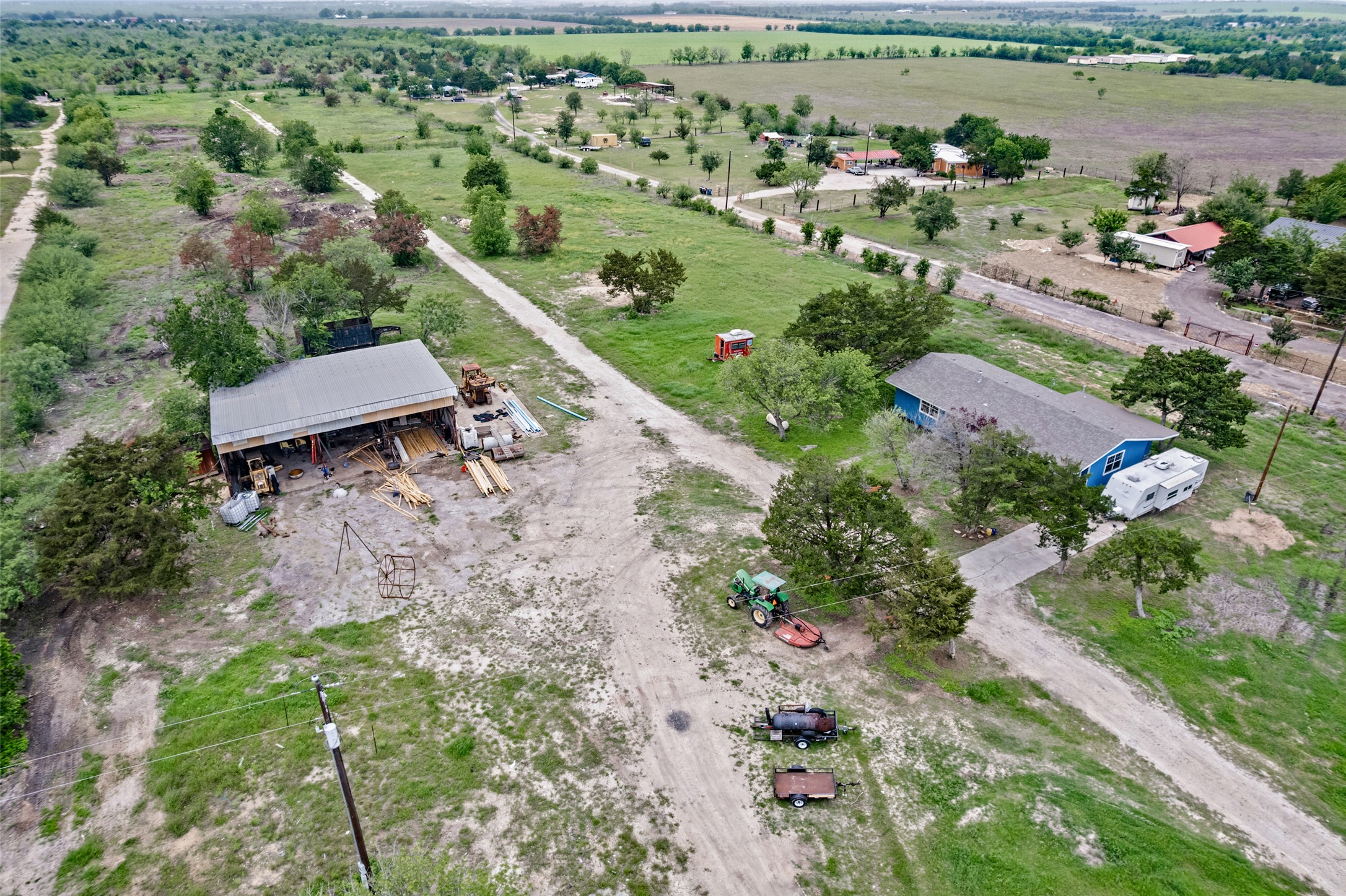 11622 Doyle Overton Road Austin, TX 78719 - Photo 12 of 20 an aerial view of a house with a yard and lake view