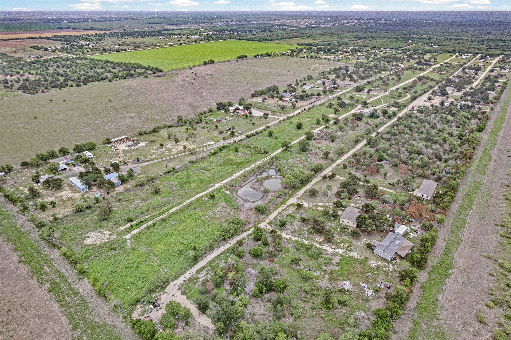 11622 Doyle Overton Road Austin, TX 78719 - Photo 17 of 20 a view of a field with a mountain