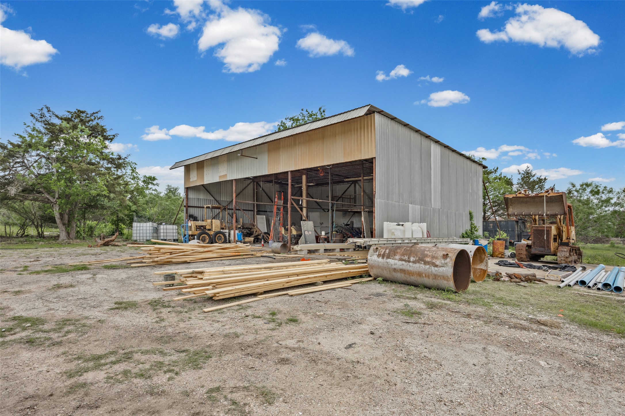 11622 Doyle Overton Road Austin, TX 78719 - Photo 7 of 20 a view of a house with backyard and sitting area