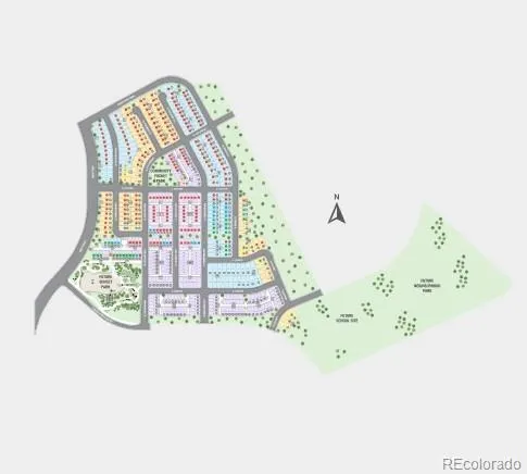 an aerial view of a residential houses with outdoor space