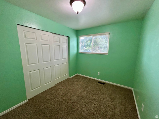 441 South 400 East Payson, UT 84651 - Photo 15 of 39 Interior room featuring green walls, a brown carpeted floor, and white baseboards