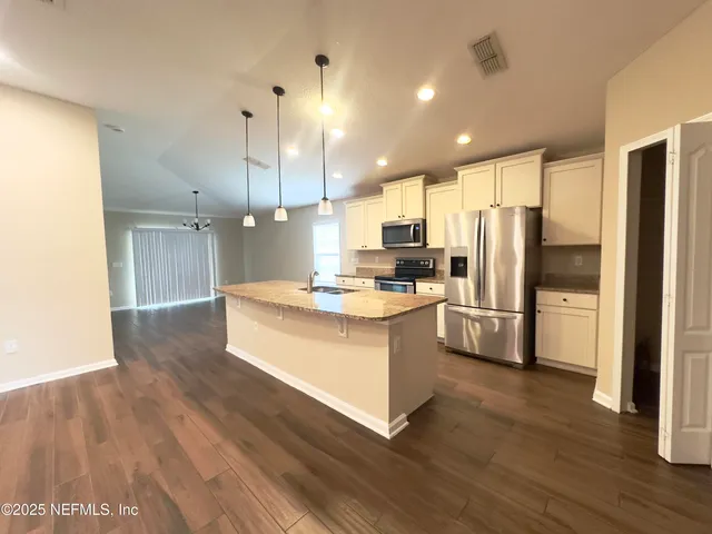 a view of house with an outdoor space and seating area