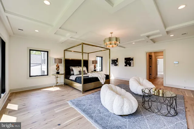 a spacious bathroom with a sink a mirror and vanity