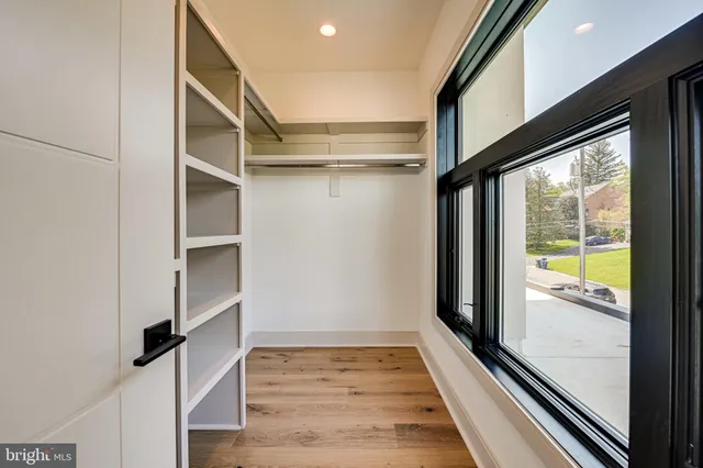 a kitchen with stainless steel appliances granite countertop a sink and stove top oven