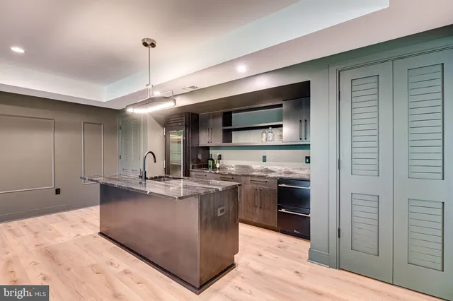a dinning room with wooden floor and hallway