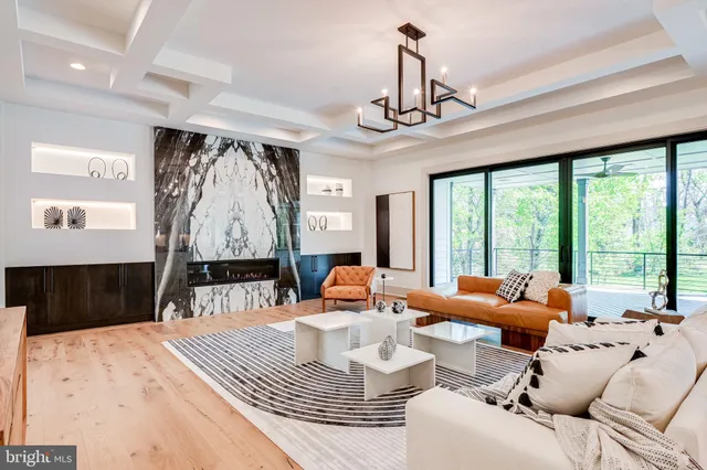 a kitchen with a table chairs stove and cabinets