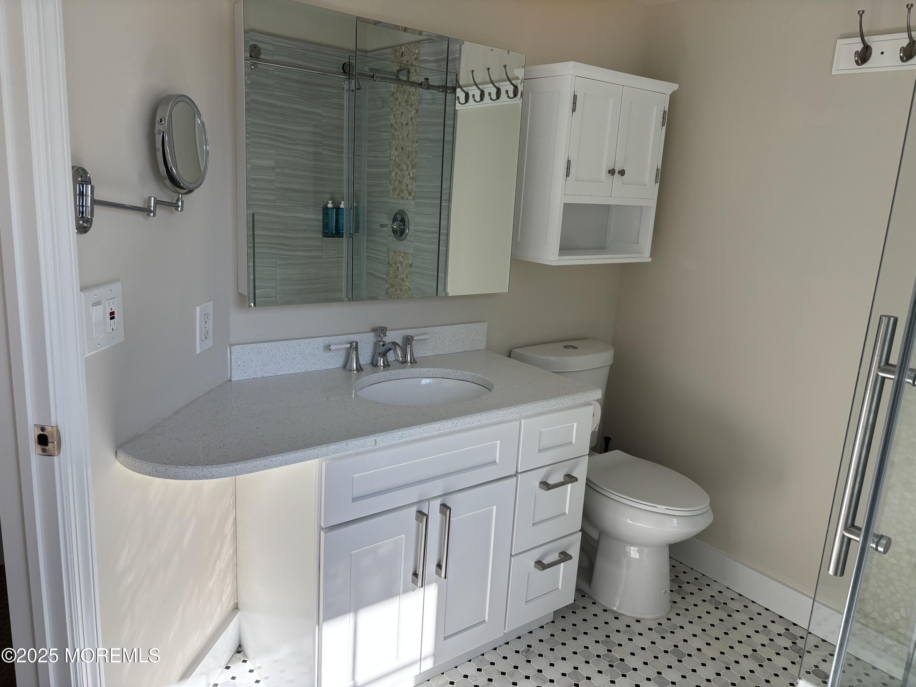 276 Sugar Maple Court Howell, NJ 07731 - Photo 23 of 34 a bathroom with a sink toilet and shower
