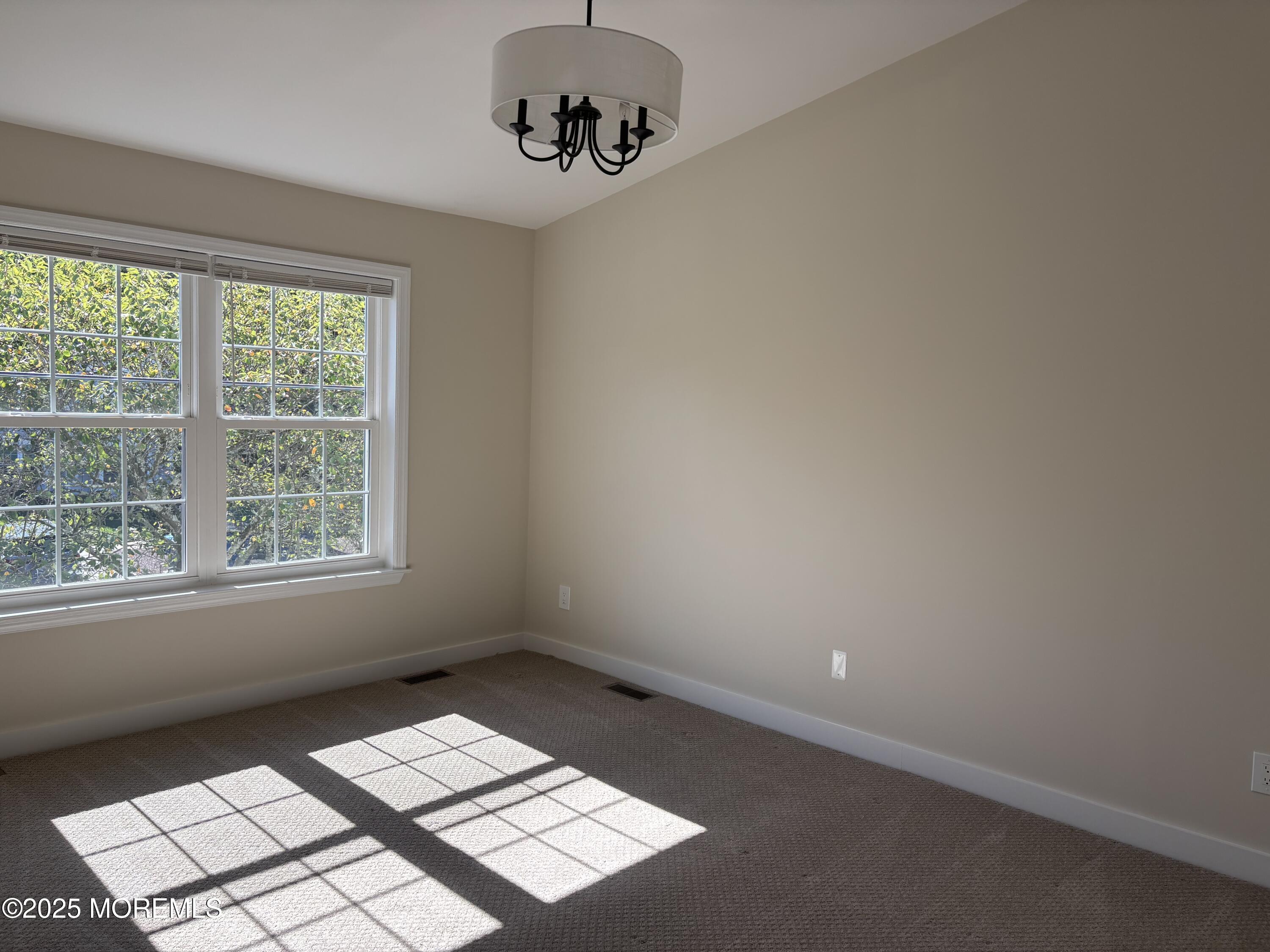 276 Sugar Maple Court Howell, NJ 07731 - Photo 29 of 34 an empty room with a window